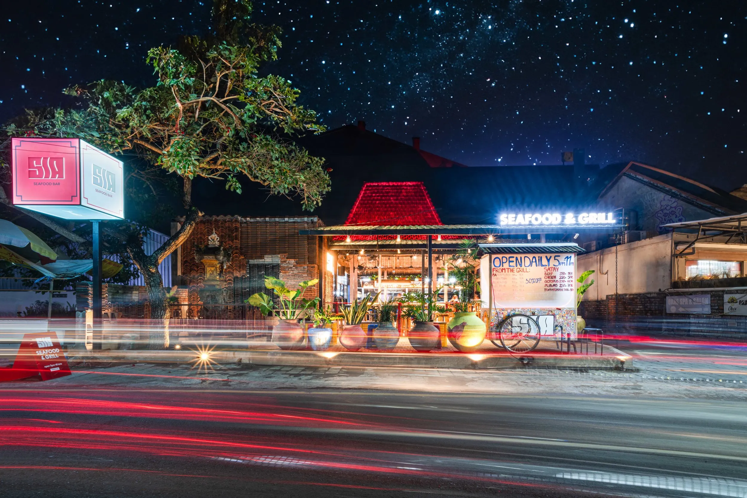 Sia seafood and grill bar at night, seen from the Canggu Shortcut